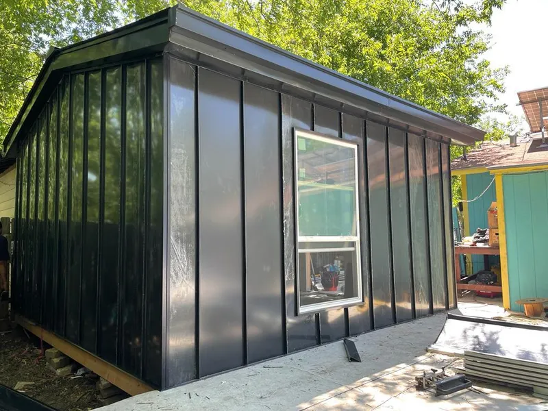 Black standing seam metal wall panels for Roof Inspection in Adelanto