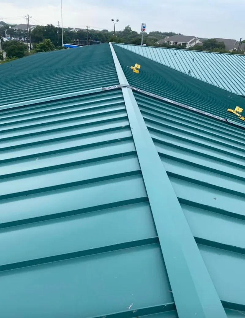 Green commercial metal roof ridge and valley for Metal Roof Repair in Adelanto